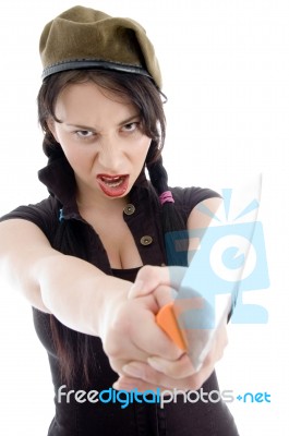 Pretty Young Female Holding Knife Stock Photo