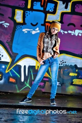 Pretty Young Girl And Graffiti Stock Photo