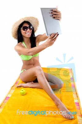 Pretty Young Girl With Green Bikini Taking Selfies With Her Digi… Stock Photo