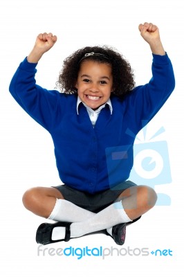 Primary School Girl Grinding Her Teeth In Excitement Stock Photo