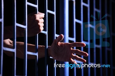 Prisoner In Jail Stock Photo