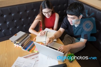 Profile Of A Happy Couple Searching Information On Line Together… Stock Photo
