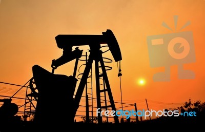 Pumpjack Pumping Crude Oil From Oil Well Stock Photo
