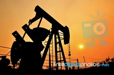 Pumpjack Pumping Crude Oil From Oil Well Stock Photo