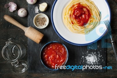 Pureed Tomatoes In A Ceramic Dish And A Plate With Spaghetti On Stock Photo