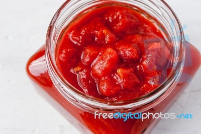 Pureed Tomatoes In A Glass Jar Stock Photo