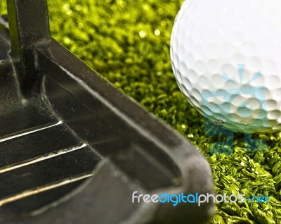 Putting A Golf Ball Stock Photo