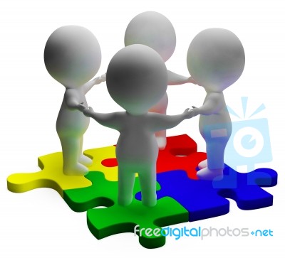 Puzzle Solved And 3d Characters Shows Unity And Teamwork Stock Image