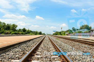 Railroad Blue Sky And Cloudy Sky Clouds Railroad Stock Photo