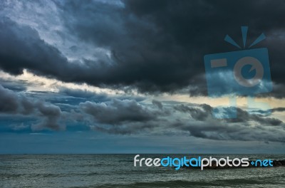 Rain Cloud Over Sea Stock Photo
