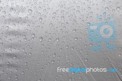 Rain Drop On Grey Plastic Background Stock Photo