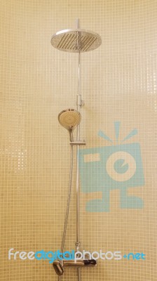 Rain Shower In Luxury Bathroom With Green Mosaic Tile Stock Photo