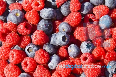 Raspberries And Blueberries Stock Photo