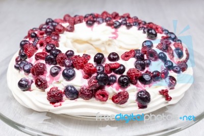 Raspberries And Blueberries Foam Pie On Glass Scale Stock Photo