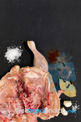 Raw Chicken With Spices Stock Photo