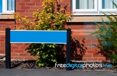 Real Estate Sign And House Stock Photo