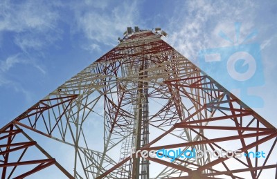 Red And White Communications Tower Stock Photo