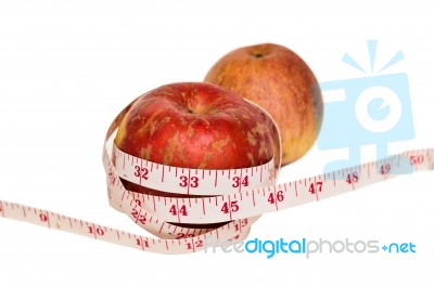 Red Apple Wth Measure Tape Stock Photo