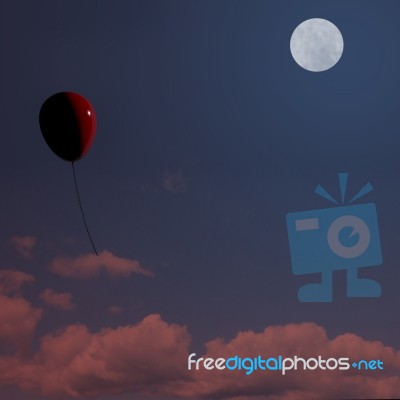 Red Balloon Floating At Night Stock Image
