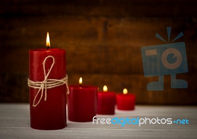 Red Candles On Wooden Floor,festive Or Spa Concept Ideas Background  Stock Photo