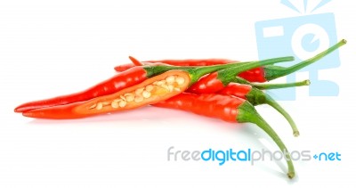 Red Chili Isolated On The White Background Stock Photo