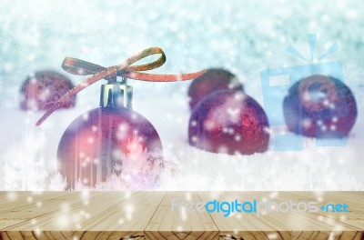 Red Christmas Ball With Bokeh In Blue Moon Tone Stock Photo