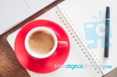 Red Coffee Cup With Notepad And Laptop Stock Photo Red Coffee Cup With Notepad And Laptop Stock Photo