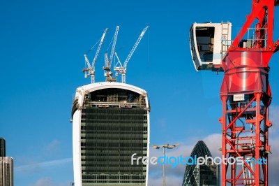 Red Crane Operating In London Stock Photo