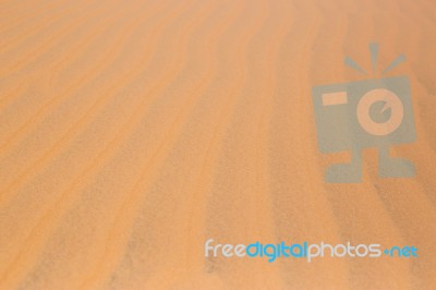 Red Desert Sand Dunes Texture Pattern Stock Photo