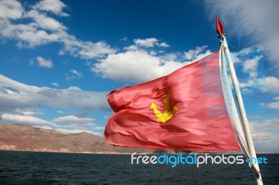 Red Flag With Anchor Sign Stock Photo