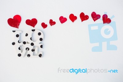 Red Hearts On White Snow Stock Photo