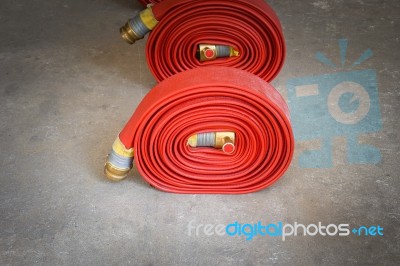 Red Hose Fire Stock Photo