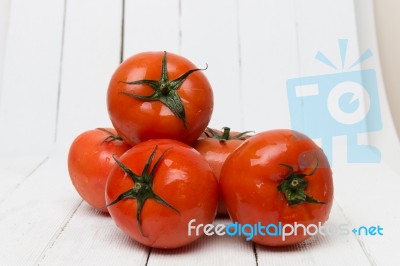 Red Tomatoes Fruits Isolated On White Stock Photo