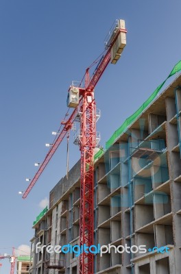 Red Tower Crane In Construction Site Stock Photo