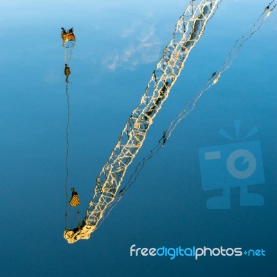 Reflection Of A Crane In A Canal In Bruges West Flanders Belgium… Stock Photo
