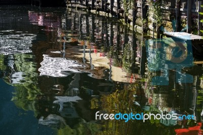 Reflections In Lake Hallstatt From An Adjacent Restaurant Stock Photo