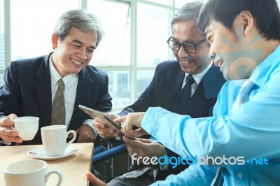 Relaxing Emotion Of Business Man In Coffee Break Time With Younger And Senior Working Friend Relation Stock Photo