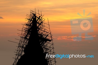 Renovated Pagoda Silhouette On Evening Sky Stock Photo