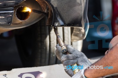 Repairing Exhaust Pipe Stock Photo