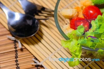 Resh Green Salad With Spoon And Fork Stock Photo