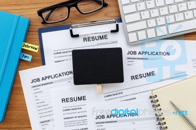 Resume And Job Application With Blank Sign Stock Photo