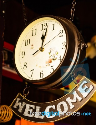 Retro Clock With Welcome Banner Stock Photo