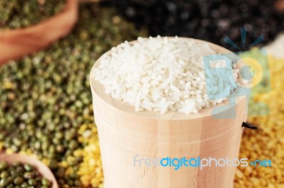Rice And Nuts On Floor Stock Photo