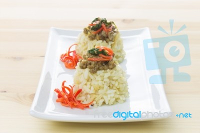 Rice Topped With Stir-fried Pork And Basil Long View Stock Photo