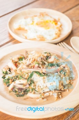 Rice Topped With Stir-fried Squid Basil And Fried Egg (thai Food… Stock Photo