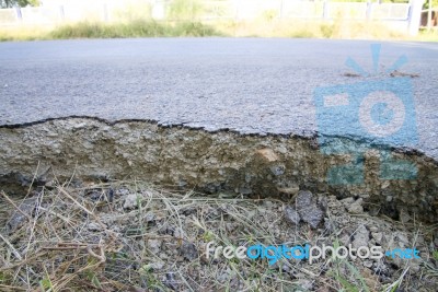 Roads Large Cracks From Shift Of Asphalt On Road Stock Photo