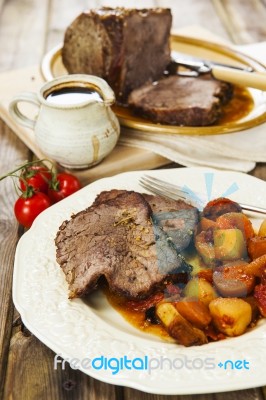 Roast Beef Joint With Roast Vegetables Stock Photo Roast Beef Joint With Roast Vegetables Stock Photo