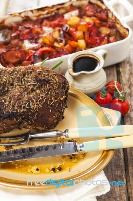 Roast Beef Joint With Roast Vegetables Stock Photo