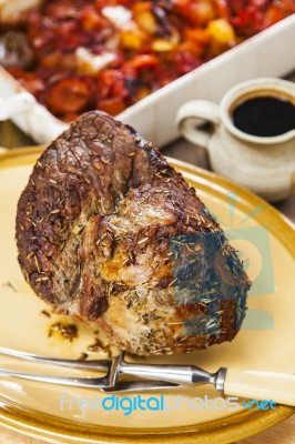 Roast Beef Joint With Roast Vegetables Stock Photo