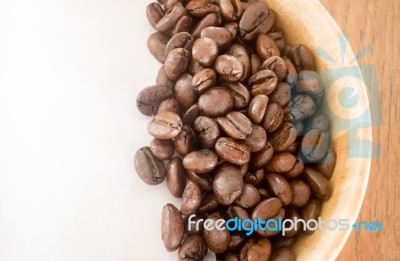 Roasted Coffee Bean In Bowl Stock Photo